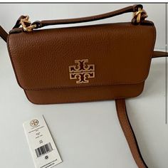 Beautiful Color That Goes With Everything. Tory Burch Britten, Mini Top, Tory Burch Bags, Tory Burch Bag, Tan Brown, Top Handle, Crossbody Bags, Beautiful Colors, Tory Burch