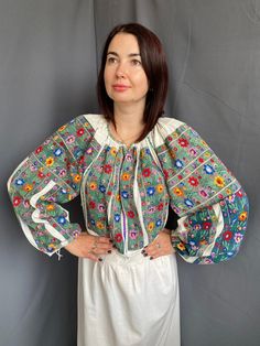 Amazing Romanian vintage dress Gorgeous heavy embroidered one ! Completely handmade!! Too saturated colours Beautiful floral design Great condition! Linen fabric Universal size Will suit to and S-L size Peasant Style Long Sleeve Embroidered Top, Traditional Long Sleeve Peasant Top With Geometric Embroidery, Green Blouse With Embroidered Sleeves For Spring, Traditional Peasant Top With Floral Embroidery For Fall, Traditional Peasant Top With Embroidered Sleeves For Fall, Traditional Fall Peasant Top With Floral Embroidery, Traditional Fall Peasant Top With Embroidered Sleeves, Multicolor Long Sleeve Peasant Blouse, Multicolor Long Sleeve Bohemian Embroidered Top