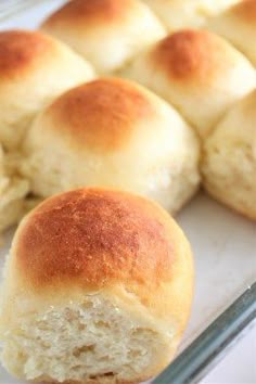 rolls are sitting on a baking sheet and ready to be baked