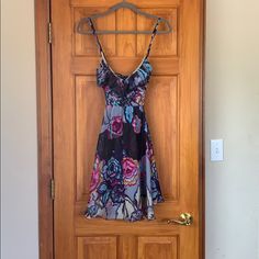 Beautiful Floral Fit And Flare Dress! Purple Summer Sundress For Parties, Purple V-neck Sundress Midi Dress, Purple Floral Print Summer Midi Dress, Purple Flowy Sundress Midi Dress, Flowy Purple Midi Sundress, Flowy Purple Sundress Midi Dress, Purple Lined Sundress, Purple Sundress For Garden Party, Summer Purple Lined Midi Dress