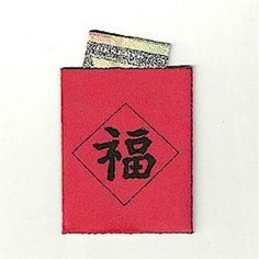 a red card case with chinese characters on it