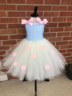 Welcome to Juliette's Tutu Shop! Accepting Halloween Orders, This listing is for a Bo Peep from Toy Story Tutu Dress. This dress is perfect for Halloween, Birthdays, Photo Shoots or just playing dress up. This is a one piece dress. The top of the dress is a crochet, very stretchy, tube top with an adjustable halter strap that ties into a cute bow in the back. The bottom of the dress is 2 layers of tulle for maximum fullness. Length of the bottom (tulle portion) of the dress is as follows: 3-6 mo Haunted Hollywood, Little Bo Peep Costume, Toy Story Costume, Buzz Lightyear Costume, Toy Story Halloween, Halloween Costumes For Work, Toy Story Costumes, Red Riding Hood Costume, Girls Costumes