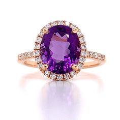 Amethyst And Diamond Ring.Metal: 18K White GoldDiamond Shape: 34 Brilliant Round Cut 0.28ct twGemstone Details: 1 Amethyst 2.66ct Dimensions: 13mm Amethyst And Diamond Ring, Rose Gold Diamond Ring, Jewelry Metal, White Gold Diamond Rings, Ring Metal, Amethyst Gemstone, Yellow Gold Rings, Round Cut, Diamond Ring