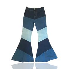 This Pair Of Pants From Peach Love California Is A Must-Have For Any Woman's Wardrobe. With A Unique Patchwork Design And Flared Leg Style, These Denim Pants Will Elevate Any Outfit. The Size Is A Comfortable L And The Color Is A Beautiful Blue That Will Complement Any Skin Tone. The Pants Are Made Of High-Quality Denim Fabric That Ensures Durability And Long-Lasting Wear. Blue Stretch Flare Jeans, High Waist Blue Stretch Flare Jeans, Trendy Blue Cotton Flare Jeans, Retro Stretch Flare Denim Jeans, Dark Wash Cotton Flare Bottoms, Blue Denim Flare Bottoms, Dark Wash Flare Cotton Bottoms, Dark Wash Cotton Flared Bottoms, Blue Flare Denim Bottoms