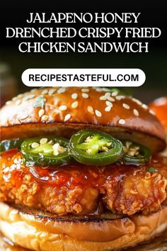 the chicken sandwich is topped with peppers and sesame seeds, on top of a bun