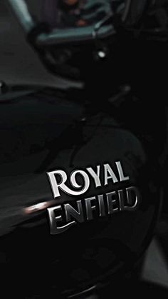 the royal enfield logo is shown on a motorcycle