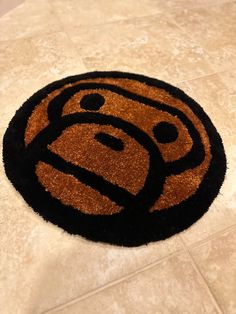 a brown and black monkey rug on the floor