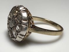 Beautiful antique rose cut diamond ring from the Georgian era. Rose cut diamonds (original and one replacement, please inquire). Top measures a generous 17mm diameter. Weight 6.5 grams. Shank is not original to the top. Ring size 8 1/4. Ring sizing service available; please see sizing fees listed below. Please allow one week for sizing. One month layaway payment plans on items $500 and over only. For sizing, please contact me through messaging either before or after purchase. Approximate Age - G Antique Rose Cut Diamond Ring, Antique Jewelry With Rose Cut Diamonds, Victorian Ceremonial Ring With Rose Cut Diamonds, Antique Ceremonial Jewelry With Rose Cut Diamonds, Luxury Antique Rose Cut Diamond Ring, European Cut Diamond Ring, Rosecut Diamond Ring, Antique Roses, Rose Cut Diamond