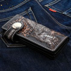 Carved Dragon Vintage Black Real Leather Biker Wallet  Genuine high grade black leather  Internal layout: 10 Credit Card Slots, 2 Bills Compartments and 1 Long Zip Compartment  Wallet measures (closed): 4 3/8"  Wallet measures (fully opened): 8" x 8"   Draw inspiration and strength from this mythical creature with our Rider Dragon Leather Biker Wallet. A piece of such impressive detail, it is sure to become a cherished favourite by any biker, rocker or gentleman.  The luxurious leather has been Carved Dragon, Biker Wallet, Game Of Thrones Fans, Mythical Creature, Mythical Creatures, Real Leather, High Grade, Vintage Black, Rocker