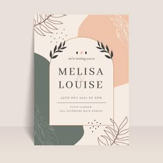 an elegant wedding card with leaves and foliage on the front, in pastel tones