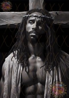 a man with dreadlocks standing in front of a cross