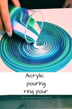 a person is pouring colored liquid into a paper with the words acrylic pouring rina pour on it