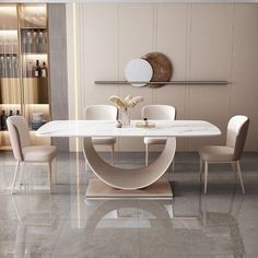 a dining room table with chairs around it