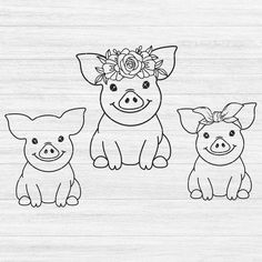 three pigs with flowers on their heads sitting next to each other