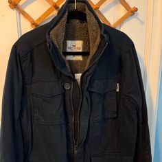 Hollister. New. Navy Cotton Outerwear For Winter, Casual Winter Outerwear With Multiple Pockets, Blue Outerwear With Multiple Pockets, Blue Outerwear With Multiple Pockets For Fall, Fall Blue Outerwear With Multiple Pockets, Blue Fall Outerwear With Multiple Pockets, Navy Winter Utility Jacket With Pockets, Blue Utility Outerwear With Pockets, Blue Winter Outerwear With Multiple Pockets