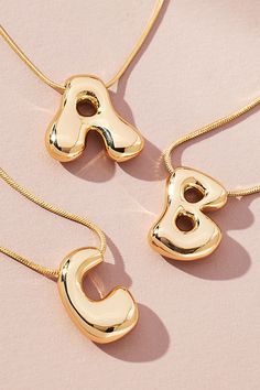 Picture this: Gift one for yourself and a handful to those who matter most. Bursting with personality, this monogram pendant necklace ( we’re obsessed ) effortlessly infuses your everyday jewelry lineup with bubbled flair. | Bubble Letter Monogram Necklace by Anthropologie, Women's, Gold/Plated Brass Auburn Clothes, Carpenter Outfits, School Finds, Bubble Letter Necklace, Monogram Pendant Necklace, Jewelry Wishlist, Bubble Letter, Preppy Jewelry, Monogram Pendant