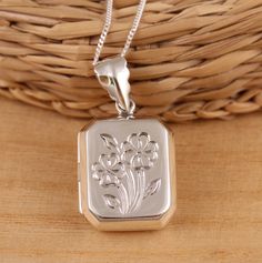 This is solid 925 sterling silver photo locket pendant. 925 stamped.    The locket has flower engraved on front side and plain highly polished on the back.   Approx. measures:           total length: 33mm         without bail: 25mm         width: 18mm Approx. weight:  5.1grams. Available on its own or with various length (16-30 Inch) 1mm curb chain, please choose from the drop - down menu at the top of the page. Both chain and locket pendant are solid sterling silver. Presented in gift box. Than Italy Jewelry, Locket Pendant Necklace, Photo Locket, Curb Chain, Solid 925 Sterling Silver, Locket, Silver Pendant, Jewelry Necklace Pendant, Etsy Accessories