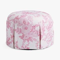 a pink and white floral print ottoman