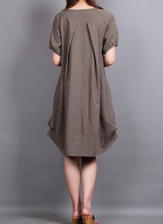 cotton pleated loose dress shirt In brown. $69.00, via Etsy. Khaki V-neck Dress With Pockets, Khaki Knee-length Spring Dress, Khaki Short Sleeve Midi Dress, Casual Asymmetrical Solid Color Dress, Gray Shift Dresses, Casual Gray Dress With Asymmetrical Hem, Spring Lagenlook Fitted Midi Dress, Elegant Gray Dress With Solid Color, Elegant Gray Solid Color Dress