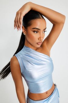 Celestial Asymmetric Top – BRIELLE Asymmetrical Zip Tops For Evening, Chic Fitted Shiny Tops, Fitted Shiny Chic Tops, Chic Party Tops With Asymmetrical Zip, Sleek Sheen Party Top, Trendy Light Blue Party Top, Trendy Light Blue Top For Party, Sleek Sheen Tops For Evening, Sleek Evening Tops With Sheen