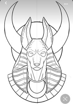 an egyptian mask with horns on it