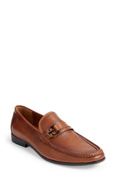 A polished metal accent bridges the vamp of this luxe loafer designed with a woven leather upper and sleek burnished finish. Leather upper/synthetic lining and sole Imported Penny Loafers Men, Rollerball Perfume, Johnston Murphy, Penny Loafer, Penny Loafers, Loafer Shoes, Loafers Men, Travel Size Products, Steve Madden