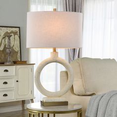 a living room scene with focus on the table lamp