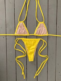 Feel sexy in this gorgeous yellow cinched adjustable thong bikini bottom. Can be paired with our matching yellow double string or basic triangle bikini top. Made with the finest quality of soft and stretchy Lycra to achieve the best fit. Order yours today or DM @jillesbikinis on Instagram for inquiries. Yellow T-back Swimwear For Beach Season, Adjustable Yellow Swimwear For The Pool, Swimwear Sewing, Swimwear Sewing Patterns, Summer Bikinis, Latest Fashion, Sewing Patterns, Spring Summer, One Piece