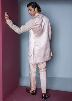 A blush pink shrug set with multi colored hand paint details, paired with kurta and pants. Pink Shrug, Kurta And Pants, Kurta Pants, Vacuum Storage, Nehru Jackets, Kurta With Pants, Hand Paint, Wedding Service, Band Collar