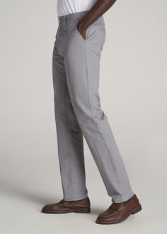 About Our Tall Chinos Stylish, comfortable and built for your frame. These men's tall pants will become your new go-to pair for any occasion. As a tall guy, you're used to having limited options when it comes to chinos, with inseams that are too short and styles that fit in all the wrong places. Chinos are meant to provide a polished look but as a tall guy, you're often stuck with a look that's more awkward than put-together. We're changing the game when it comes to pants for tall men. These chi Tall Men, Tall Pants, Pebble Grey, Grey Pants, Tall Guys, Too Short, Polished Look, Chinos Pants, Cotton Spandex