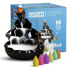 an inflatable black and white fountain with colorful candy cones