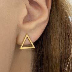 Triangle Stud earrings! ▸Handmade of Sterling Silver 925 that is 24k DOUBLE Gold filled High-quality gold finish that is made to last for a long time 😌 >> Handcrafted with love for you in Greece! Suitable for women of all ages! SIZE The diameter of the triangle is 0.55 inches - 1,4 cm. All Artiby jewelry comes in beautiful packaging, gift-ready. >>IS IT A GIFT? If you wish to send a personal message, please name it at the checkout process! ------------------------------------------- Simple Gold Studs, Triangle Stud Earrings, Earrings Triangle, Triangle Earrings Stud, Hematite Necklace, Triangle Studs, Packaging Gift, Earrings Dainty, Gold Choker