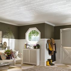 a living room filled with furniture and lots of clutter on top of the floor