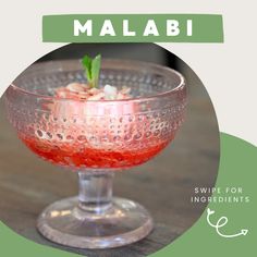 a close up of a glass on a table with text overlay that reads,'malabi swipe for ingredients '