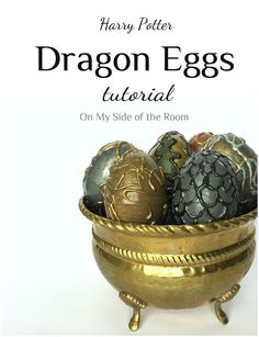 the cover of harry potter's dragon eggs book, with an image of several different colored eggs in a gold bowl