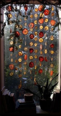 a window covered in lots of different colored glass discs