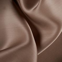 a close up view of a brown fabric