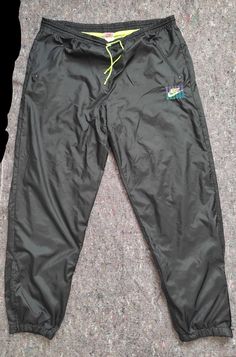 Vintage trackpants from the 90s With lining, 2 zipped pockets and zipped leg opening Important - please note, there is a repaired hole on the front part(see picture) Size M(for the height 178-180 cm) Full length 109 cm In seam 79 cm Front rise 32 cm Waist up to 59 cm(flat measurement(for round X2))