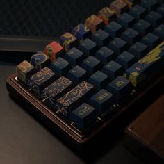 a computer keyboard sitting on top of a desk