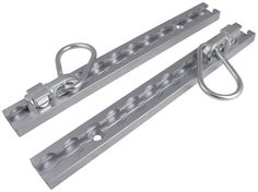 pair of stainless steel door closers with hook and eyelets on white background photo