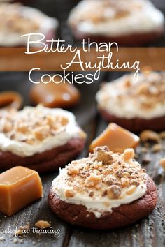 cookies with white frosting and caramel on top are sitting on a wooden table