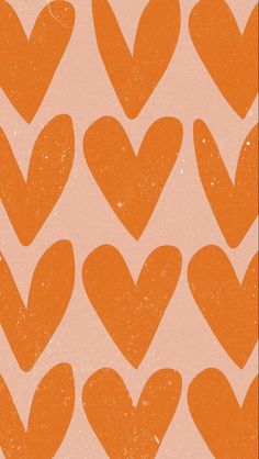 an orange and pink background with many hearts in the shape of heart shapes on top of each other