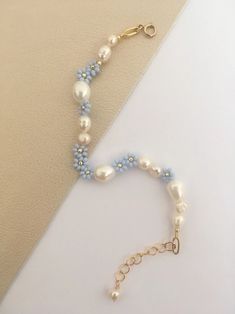 Light Blue Beaded Flower and Pearl Bracelet/delicate Bead and - Etsy Cute Bead Bracelet Ideas, Cute Jewelry Ideas, Diy Gold Jewelry, Bead Bracelets Ideas, Pearl Bracelet Ideas, Light Blue Accessories, Homemade Jewelry Ideas, Diy Pearl Bracelet, Trendy Diy Jewelry