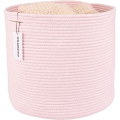 a pink basket with a tag on the front and bottom, it has a white label hanging