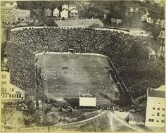 an aerial view of a football stadium with many people in it and on the field