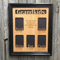 a wooden plaque with the words grandkids engraved on it and four different frames