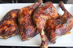 three pieces of chicken on a white plate