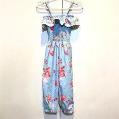 Brand New With Tags. One Piece Jumpsuit For Toddler Girl 24 Months. Ruched Bodice And Spaghetti Straps With Ruffle Detail Around The Top. Light Blue And Pink Floral Design. Flowers Are Pink. So Pretty! Spring Blue Jumpsuits And Rompers For Playwear, Blue Casual Jumpsuits And Rompers For Playwear, Blue Floral Jumpsuit, Toddler Girl Romper, Brown Jumpsuits, One Piece Jumpsuit, Pink Floral Design, Wide Leg Romper, Linen Romper