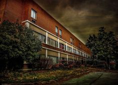 the old south pittsburg hospital, tennessee is featured in this postcard for ghost hunt usa