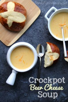 there is a bowl of soup and two bowls of soup on the table